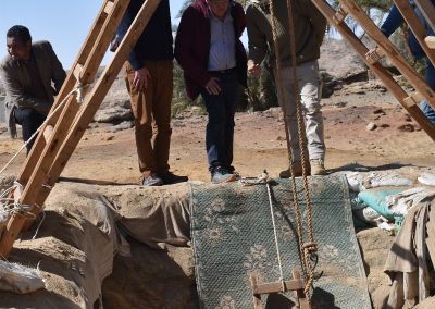 John showing the waterlogged shaft-tomb