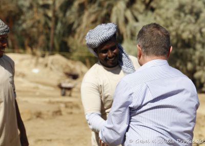 H.E. Ambassador Thesleff greeting Hamoudi, one of our great workers!